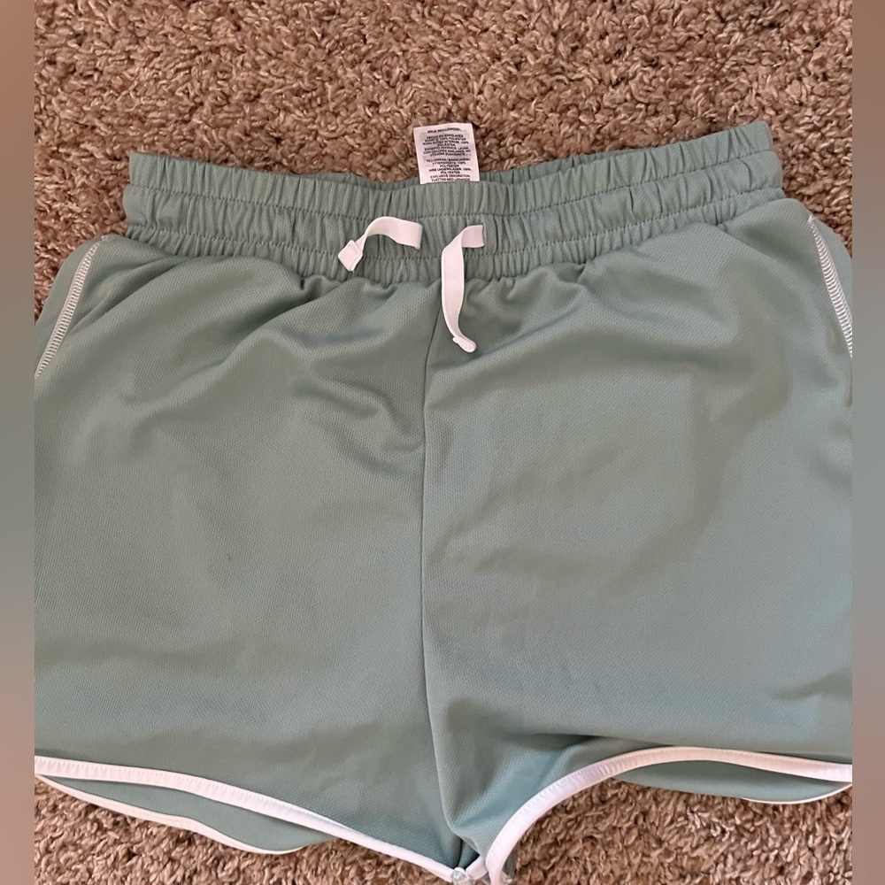 Teal gymshark shorts.